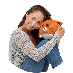woman holding waggables plush